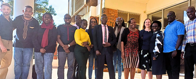 A group of participants in an LSE workshop in Africa standing in a line