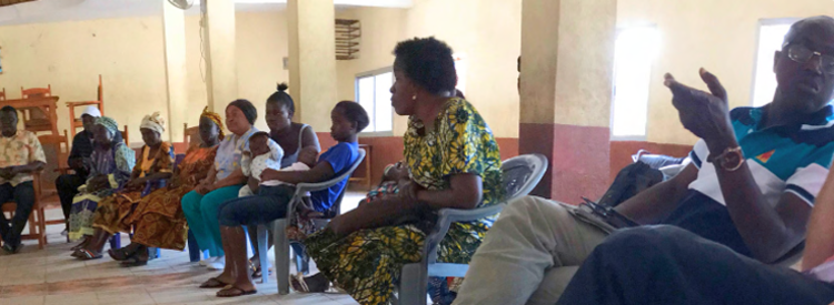 Participants in a CPAID workshop seated in the round