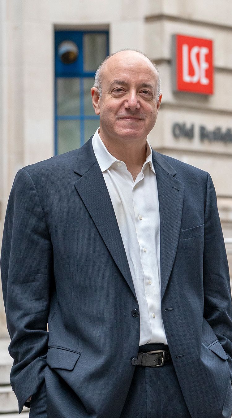 LSE President Larry Kramer smiling outside the Old Building.